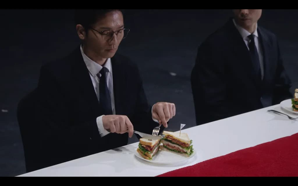 Katseye Gnarly MV | Asian Man Slicing a Sandwich